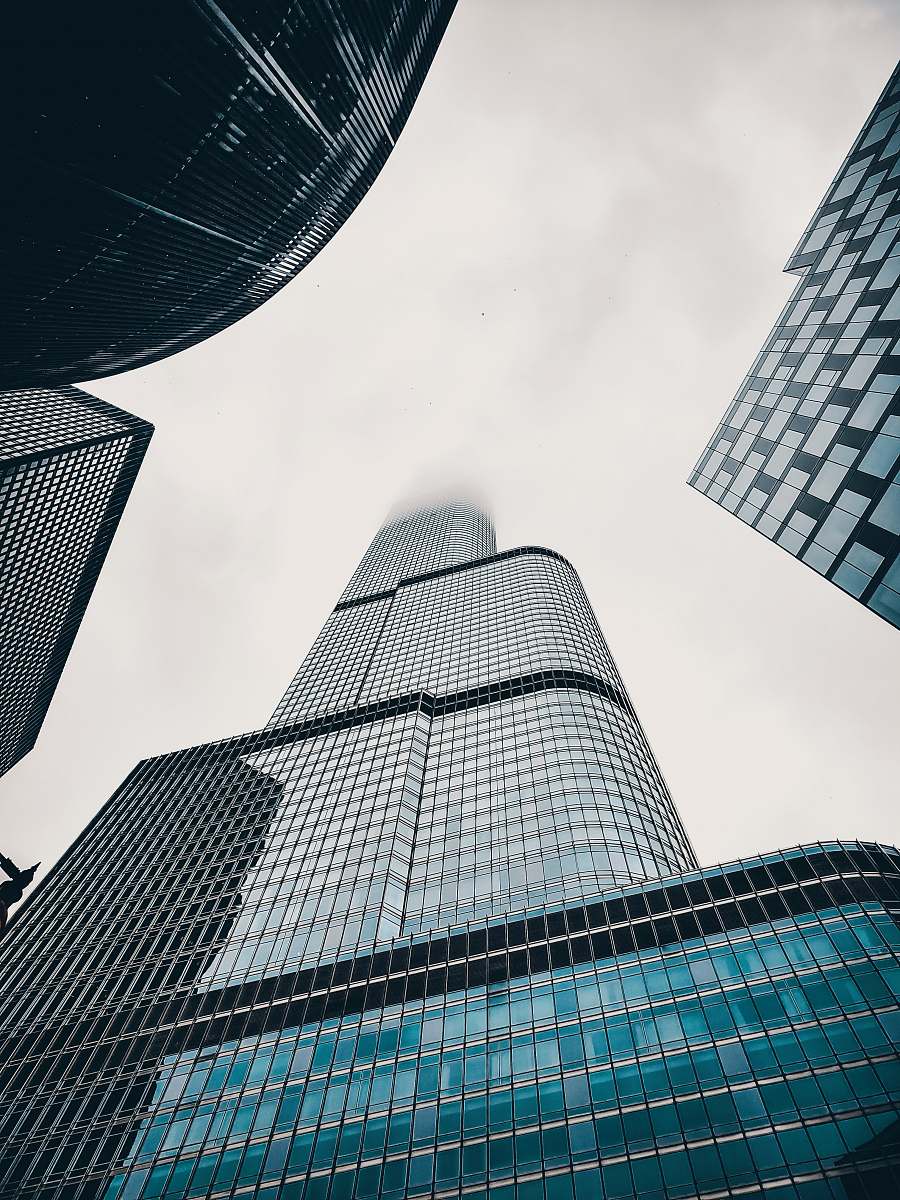 office building low-angle photography of curtain wall high-rise building during daytime city